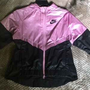 Pink and black Nike windbreaker .